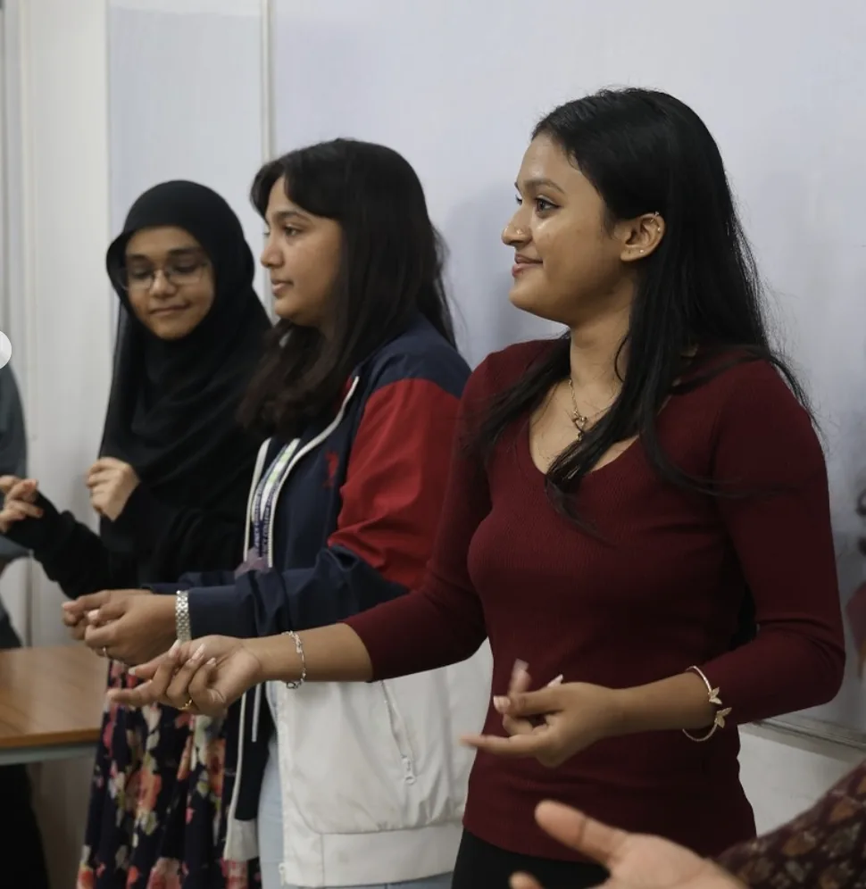 Students taking part in a classroom activity together