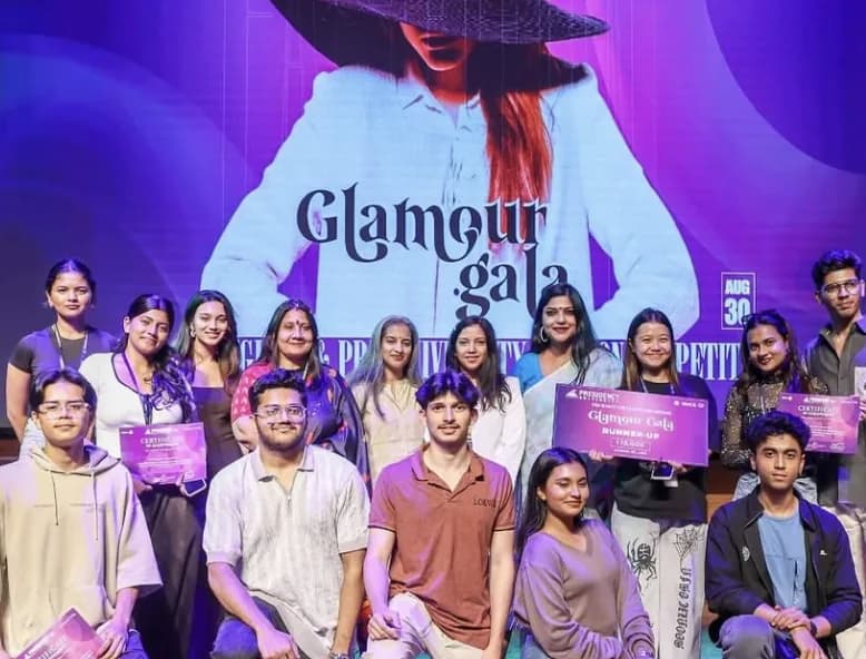 Students holding certificates at the Glamour Gala event